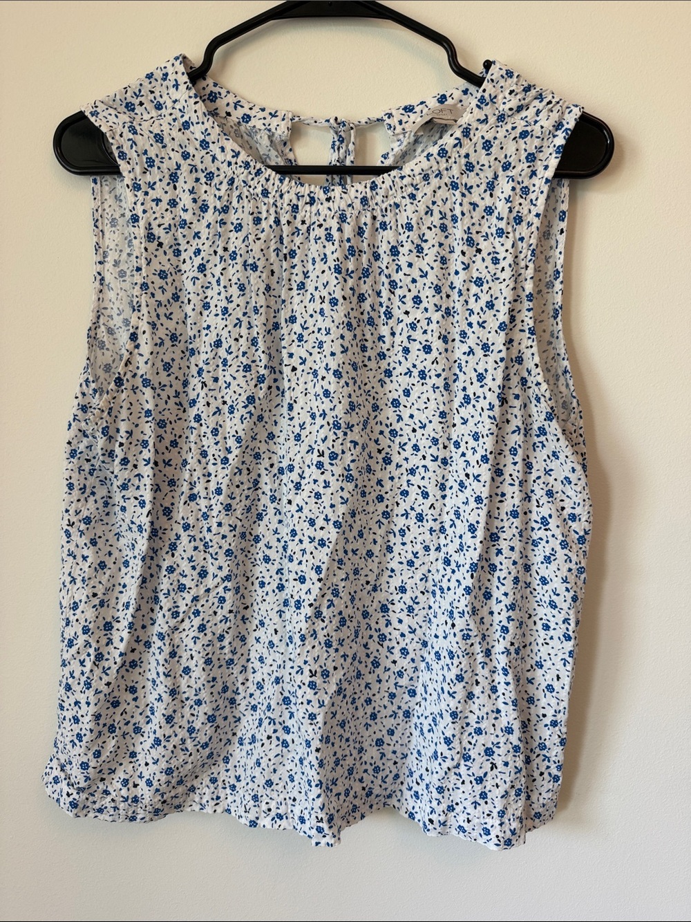 White and blue floral top